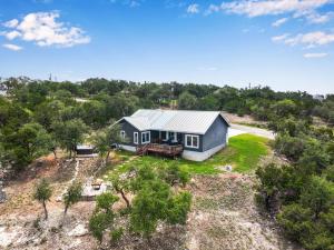 an aerial view of a house on a field at View La-La! in Canyon Lake