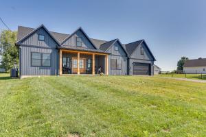a house with a large lawn in front of it at Walk to the Amish Village Spacious Ronks Getaway! in Ronks