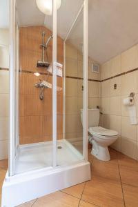 Kúpeľňa v ubytovaní Apartamenty Kluśka + 37 fotografií