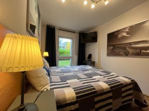 Posteľ alebo postele v izbe v ubytovaní Apartament Marcin