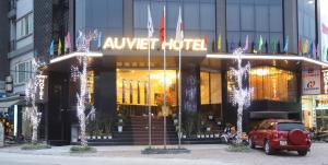 a car parked in front of a music store at Au Viet Hotel in Hanoi