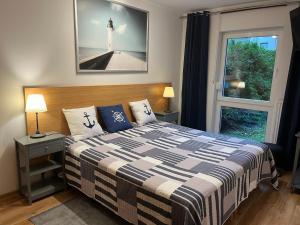 Posteľ alebo postele v izbe v ubytovaní Apartament Marcin