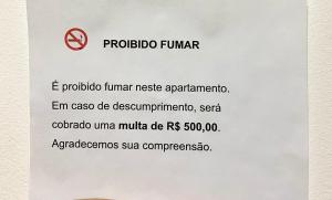 a white envelope with the words polio trump trumpiniiniiniiniiniinienna at Kitnet funcional perto da praia Ocian! in Samaritá +3 photos