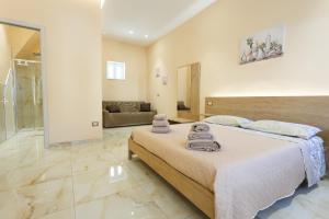 Un pat sau paturi într-o cameră la Room - Vista Mare