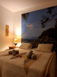 En eller flere senge i et værelse på Viva a Ilha mais Bela - 150m das praia do Viana e siriúba