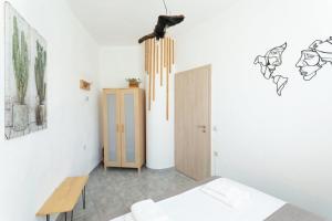 A bed or beds in a room at Eden apartments Paliouri- Concordia apartment