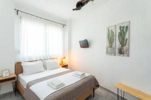A bed or beds in a room at Eden apartments Paliouri- Concordia apartment Még 20 kép