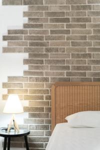 A bed or beds in a room at Eden apartments Paliouri- Concordia apartment