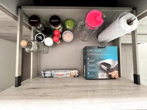 a drawer with food and other items in a room at Top apartment! in Benajarafe