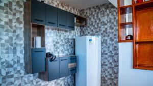 Kuchnia lub aneks kuchenny w obiekcie Casa com lareira, Wi-Fi e varanda com vista