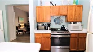 Kuchyň nebo kuchyňský kout v ubytování Lands End