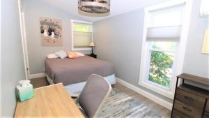 Postel nebo postele na pokoji v ubytování Lands End