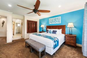 En eller flere senge i et værelse på Halii Kai 20F + 48 billeder