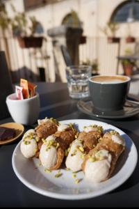 a plate of food on top of a table at A casa di Carmen in Modica