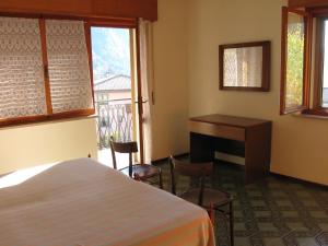 A bed or beds in a room at Lander Residence