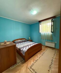 Postel nebo postele na pokoji v ubytování Ninas Apartment