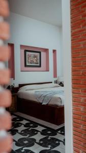 Hotel Siglo 17客房内的一张或多张床位