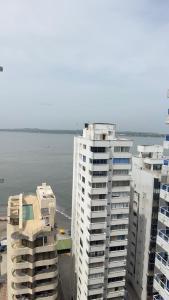 an aerial view of two tall buildings next to the water at Hospedaje,Cartagena,Clasicos,Turismocolombia-fit in Cartagena de Indias