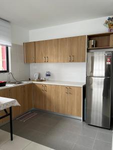 Η κουζίνα ή μικρή κουζίνα στο AJ Staycation in Kota Warisan, Sepang