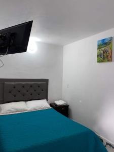 Postel nebo postele na pokoji v ubytování Vista Farallones Hostel