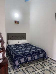 Postel nebo postele na pokoji v ubytování Vista Farallones Hostel