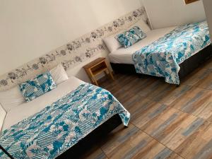 Rúm í herbergi á Hotel Santa Fe del Parque