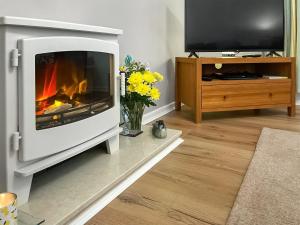 TV a/nebo společenská místnost v ubytování Aidan - 28254