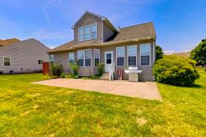a large house with a driveway in a yard at Wedgefield --- 27 Wedgefield in Ocean View