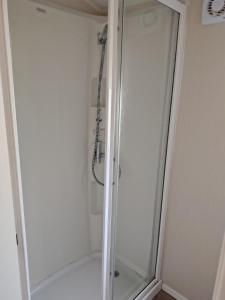 Et badeværelse på 3 bed Sleeps 8 Wifi and Linen inc