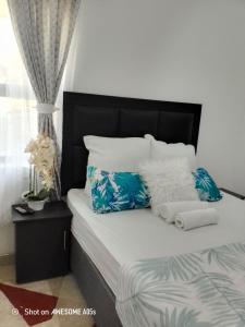 Ένα ή περισσότερα κρεβάτια σε δωμάτιο στο Dups Guest House, +30 φωτογραφίες