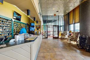 a lobby of a store with a counter and chairs at Misty Morning in Sugar Mountain