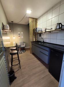 Η κουζίνα ή μικρή κουζίνα στο Espaço inteiro apartamento em Florianópolis 05