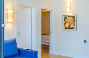 Postel nebo postele na pokoji v ubytování King Suite Panorama Central Hotel
