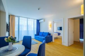 Posezení v ubytování King Suite Panorama Central Hotel