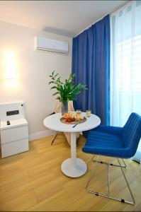 Posezení v ubytování King Suite Panorama Central Hotel