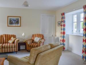 Χώρος καθιστικού στο Dairy Cottage
