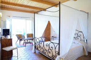 A bed or beds in a room at Agriturismo al Colle