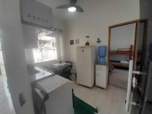 Postel nebo postele na pokoji v ubytování Flat novo 05 a pé Prainha de Mambucaba Paraty RJ