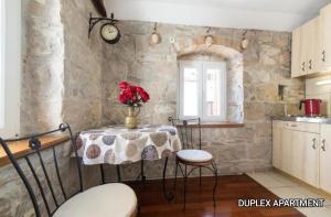 Kuchyň nebo kuchyňský kout v ubytování Guesthouse Mirula