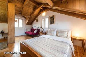 Postel nebo postele na pokoji v ubytování Guesthouse Mirula