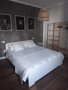 Postel nebo postele na pokoji v ubytování Loft 23 + 11 fotografií