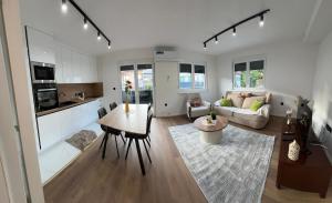 Η κουζίνα ή μικρή κουζίνα στο Luxe Urban Apartments Ilidza