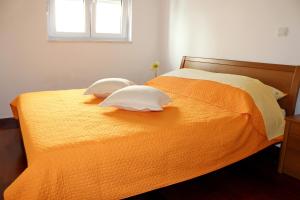 Postel nebo postele na pokoji v ubytování Apartment Beachfront