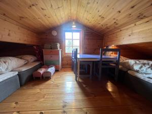 En eller flere senge i et værelse på 5 person holiday home in Bredaryd