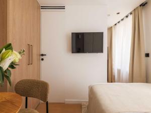 TV a/nebo společenská místnost v ubytování Elegant Studio 2P Montorgueil Grands Boulevards