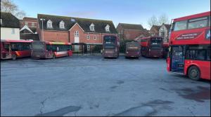 a group of buses parked in a parking lot at Modern Stay - Walk to Everything 2 in Ipswich +6 photos