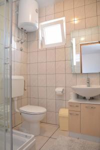 Koupelna v ubytování Apartments Janja