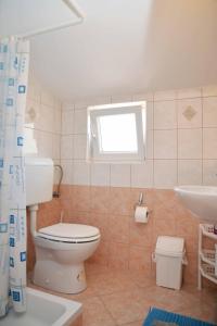 Koupelna v ubytování Apartments Janja + 37 fotografií