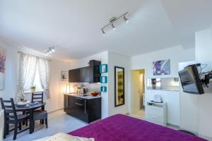 Kuchyň nebo kuchyňský kout v ubytování Apartment MiNo