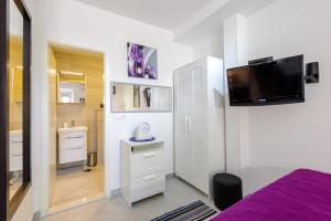 TV a/nebo společenská místnost v ubytování Apartment MiNo